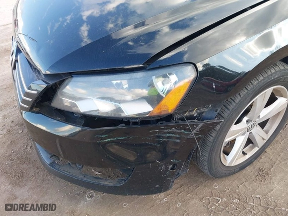 2014 Volkswagen Passat SE w/Sunroof with VIN 1VWBT7A30EC055472, listed as a IAAI auction lot 40975011 with 133,967 mi miles. Bid and sale history available at carsss.com. Image 13.