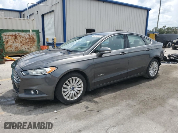 2015 Ford Fusion SE Hybrid with VIN 3FA6P0LUXFR220930, listed as a Copart auction lot 58407235 with 179,682 mi miles and Salvage title. Bid and sale history available at DreamBid. Image 1.