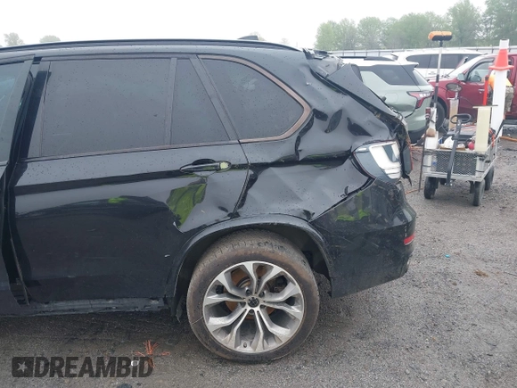 2015 BMW X5 xDrive50i z VIN 5UXKR6C56F0J78575, wystawiony jako IAAI lot #41933018 z przebiegiem Nie podano mil oraz . Historia ofert i sprzedaży dostępna na DreamBid. Obrazek 19.