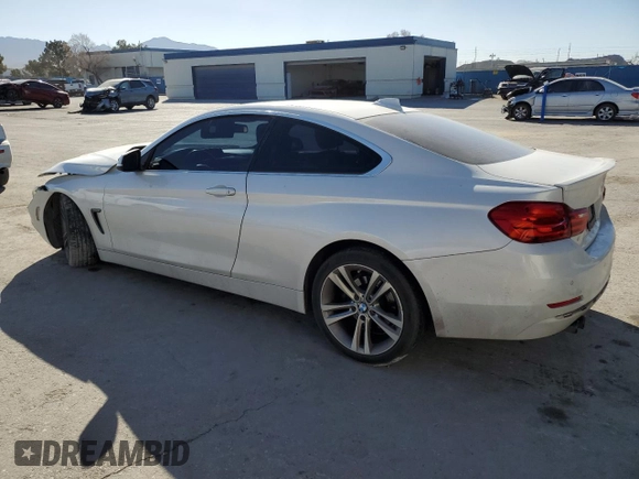 2016 BMW 4 Series 428i with VIN WBA3N7C57GK226143, listed as a Copart auction lot 44036805 with 117,218 mi miles and Salvage Title. Bid and sale history available at carsss.com. Image 2.