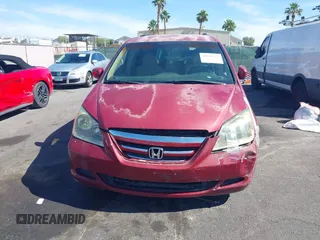 2005 Honda Odyssey EX z VIN 5FNRL38445B401163, wystawiony jako IAAI lot #42294253 z przebiegiem 152 576 mil mil oraz . Historia ofert i sprzedaży dostępna na DreamBid. Obrazek 6.