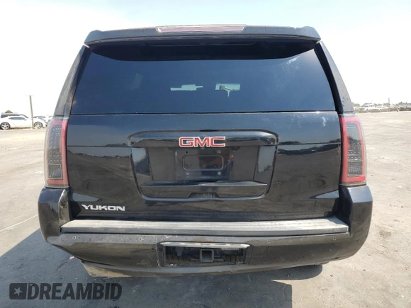 2016 GMC Yukon SLT with VIN 1GKS1BKCXGR122111, listed as a Copart auction lot 69900124 with 73,781 mi miles and Salvage Title. Bid and sale history available at carsss.com. Image 6.
