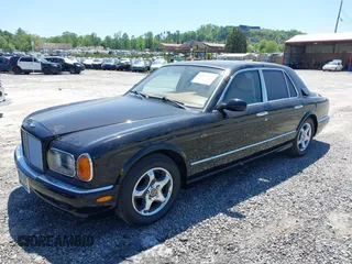 1999 Bentley Arnage z VIN SCBLB51E1XCX01401, wystawiony jako IAAI lot #42133144 z przebiegiem 29 699 mil mil oraz . Historia ofert i sprzedaży dostępna na DreamBid. Obrazek 17.