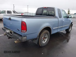1998 Ford F-150 with VIN 1FTZX1762WKB76211, listed as a IAAI auction lot 41518425 with 265,987 mi miles and . Bid and sale history available at DreamBid. Image 4.
