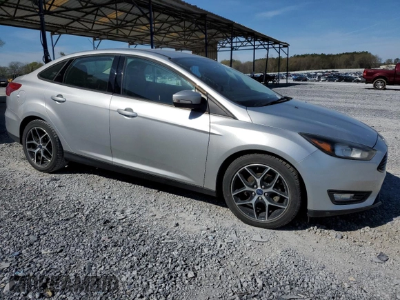 2017 Ford Focus SE with VIN 1FADP3FE0HL336863, listed as a Copart auction lot 50493435 with 64,451 mi miles and Clean Title. Bid and sale history available at DreamBid. Image 4.