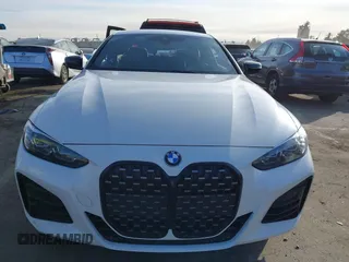 2021 BMW 4 Series M440i xDrive with VIN WBA13AR09MCF64044, listed as a IAAI auction lot 41391508 with 29,007 mi miles and . Bid and sale history available at DreamBid. Image 12.