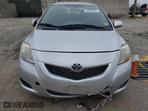 2012 Toyota Yaris with VIN JTDBT4K35CL037319, listed as a Copart auction lot 46098585 with 126,039 mi miles and Salvage Title. Bid and sale history available at DreamBid. Image 5.