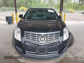 2014 Cadillac SRX Luxury Collection z VIN 3GYFNEE36ES677883, wystawiony jako IAAI lot #42260861 z przebiegiem 51 730 mil mil oraz . Historia ofert i sprzedaży dostępna na DreamBid. Obrazek 12.
