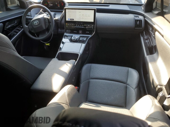 2024 Toyota bZ4X XLE with VIN JTMABACA6RA065029, listed as a Copart auction lot 43008655 with 15,489 mi miles and Salvage Title. Bid and sale history available at DreamBid. Image 8.