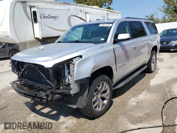 2015 GMC Yukon XL SLE with VIN 1GKS2GKC4FR678777, listed as a Copart auction lot 68642194 with 151,909 mi miles and Salvage Title. Bid and sale history available at carsss.com. Image 1.