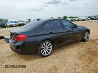 2018 BMW 3 Series 320i with VIN WBA8A9C56JAH12021, listed as a Copart auction lot 58971175 with 100,317 mi miles and Salvage title. Bid and sale history available at DreamBid. Image 3.