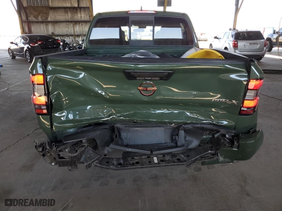 2022 Nissan Frontier PRO-X with VIN 1N6ED1EJ8NN668704, listed as a Copart auction lot 74033864 with 56,198 mi miles and Salvage Title. Bid and sale history available at carsss.com. Image 6.