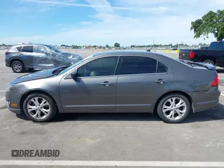 2011 Ford Fusion SE with VIN 3FAHP0HA9BR113630, listed as a IAAI auction lot 42024520 with 126,174 mi miles. Bid and sale history available at carsss.com. Image 14.