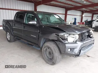 2015 Toyota Tacoma with VIN 3TMLU4EN6FM198795, listed as a IAAI auction lot 41612057 with 103,001 mi miles. Bid and sale history available at carsss.com. Image 1.