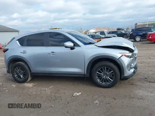 2020 Mazda CX-5 Touring with VIN JM3KFACM5L0768371, listed as a IAAI auction lot 41862623 with 138,446 mi miles and . Bid and sale history available at carsss.com. Image 13.