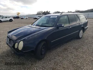 2001 Mercedes-Benz E-Class with VIN WDBJH65JX1B387291, listed as a Copart auction lot 79756824 with 261,205 mi miles and Salvage Title. Bid and sale history available at carsss.com. Image 1.