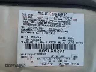 2007 Ford Taurus SE with VIN 1FAFP53U27A156844, listed as a Copart auction lot 59204695 with 157,633 mi miles and Salvage title. Bid and sale history available at DreamBid. Image 12.