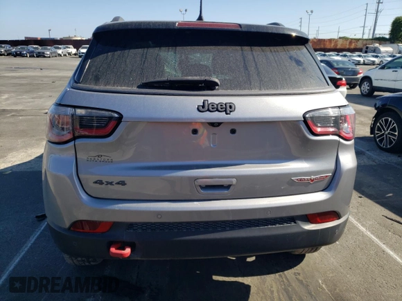 2019 Jeep Compass Trailhawk z VIN 3C4NJDDB7KT661987, wystawiony jako Copart lot #56064785 z przebiegiem Nie podano mil oraz Szkoda całkowita • Salvage title. Historia ofert i sprzedaży dostępna na DreamBid. Obrazek 6.