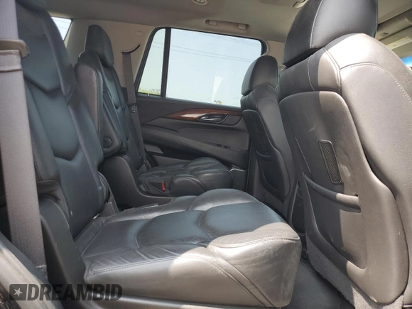 2020 Cadillac Escalade Luxury z VIN 1GYS4BKJ6LR285845, wystawiony jako Copart lot #68504204 z przebiegiem 60 677 mil mil oraz Szkoda całkowita • Salvage title. Historia ofert i sprzedaży dostępna na DreamBid. Obrazek 11.