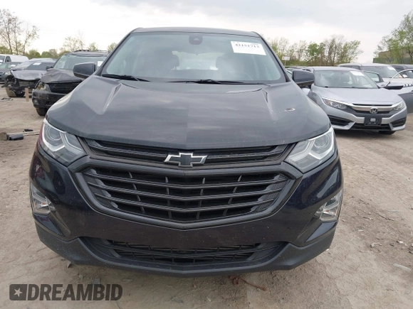 2020 Chevrolet Equinox LT z VIN 2GNAXKEV3L6100175, wystawiony jako IAAI lot #42151713 z przebiegiem 56 603 mil mil oraz . Historia ofert i sprzedaży dostępna na DreamBid. Obrazek 12.