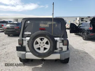 2008 Jeep Wrangler Sahara with VIN 1J4FA54148L561961, listed as a Copart auction lot 50770895 with 126,516 mi miles and Salvage title. Bid and sale history available at DreamBid. Image 6.