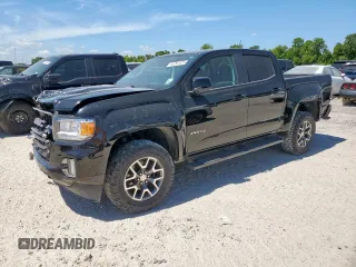 2021 GMC Canyon 4WD AT4 with VIN 1GTG6FEN1M1103173, listed as a Copart auction lot 65282525 with 58,829 mi miles and Salvage title. Bid and sale history available at DreamBid. Image 1.