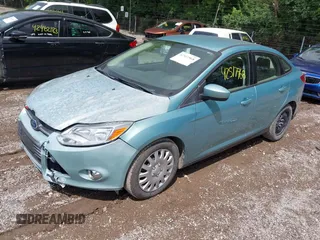 2012 Ford Focus SE with VIN 1FAHP3F25CL261609, listed as a IAAI auction lot 42517968 with 169,109 mi miles and . Bid and sale history available at DreamBid. Image 2.