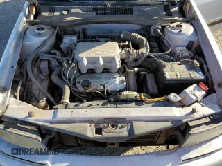 1991 Dodge Spirit z VIN 1B3XA5639MF549470, wystawiony jako Copart lot #76051284 z przebiegiem 62 309 mil mil oraz Szkody całkowita. Historia ofert i sprzedaży dostępna na DreamBid. Obrazek 11.