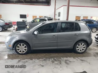2009 Volkswagen Rabbit S with VIN WVWDB71K39W142437, listed as a IAAI auction lot 42426555 with 154,571 mi miles and . Bid and sale history available at DreamBid. Image 14.