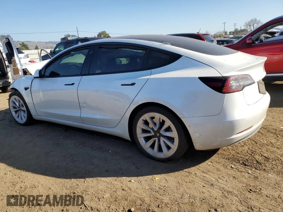 2021 Tesla Model 3 Standard Range Plus with VIN 5YJ3E1EA0MF017765, listed as a Copart auction lot 42776525 with 54,873 mi miles and Salvage Title. Bid and sale history available at carsss.com. Image 2.