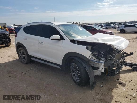 2020 Hyundai Tucson Sport with VIN KM8J33ALXLU093849, listed as a Copart auction lot 82670704 with 87,584 mi miles and Clean title. Bid and sale history available at DreamBid. Image 4.