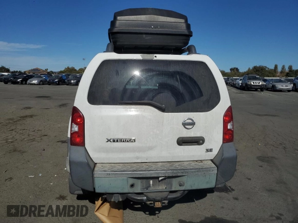 2005 Nissan Xterra SE z VIN 5N1AN08W05C646817, wystawiony jako Copart lot #76041464 z przebiegiem 167 914 mil mil oraz Szkoda całkowita • Salvage title. Historia ofert i sprzedaży dostępna na DreamBid. Obrazek 6.