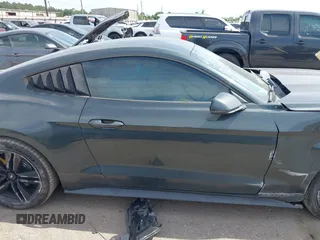 2016 Ford Mustang EcoBoost z VIN 1FA6P8TH0G5289907, wystawiony jako IAAI lot #42057565 z przebiegiem 129 917 mil mil oraz . Historia ofert i sprzedaży dostępna na DreamBid. Obrazek 13.