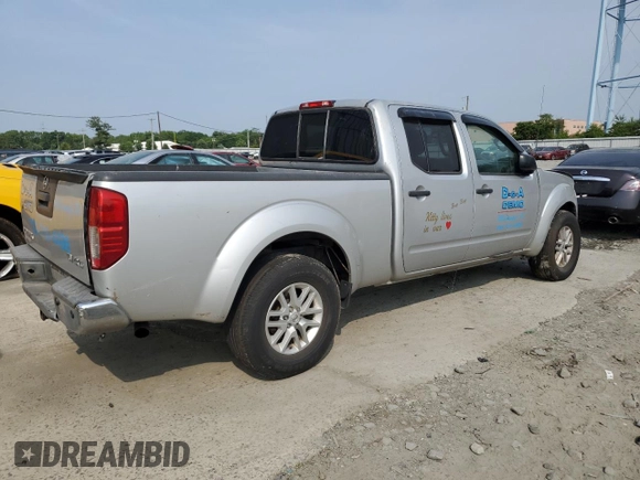 2014 Nissan Frontier SV with VIN 1N6AD0FV1EN734214, listed as a Copart auction lot 59261715 with 114,413 mi miles and Salvage title. Bid and sale history available at DreamBid. Image 3.