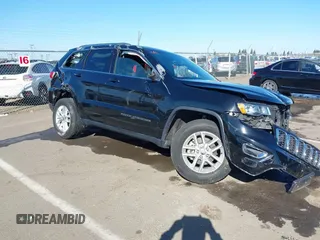 2018 Jeep Grand Cherokee Altitude with VIN 1C4RJEAG6JC300803, listed as a IAAI auction lot 41665023 with 158,828 mi miles. Bid and sale history available at carsss.com. Image 1.