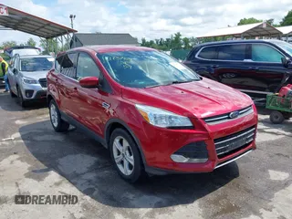 2016 Ford Escape SE z VIN 1FMCU9GX0GUB51525, wystawiony jako IAAI lot #42237629 z przebiegiem 76 616 mil mil oraz . Historia ofert i sprzedaży dostępna na DreamBid. Obrazek 1.