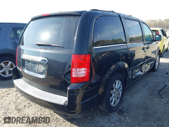 2008 Chrysler Town & Country Touring with VIN 2A8HR54P48R708923, listed as a IAAI auction lot 41917518 with 233,971 mi miles. Bid and sale history available at carsss.com. Image 4.