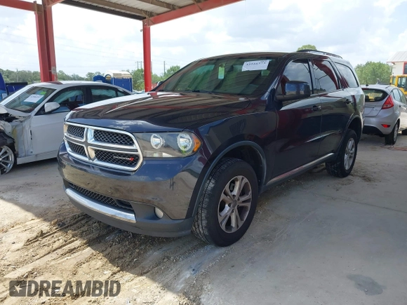 2012 Dodge Durango SXT z VIN 1C4RDHAG8CC247520, wystawiony jako IAAI lot #42516373 z przebiegiem 154 691 mil mil oraz . Historia ofert i sprzedaży dostępna na DreamBid. Obrazek 2.