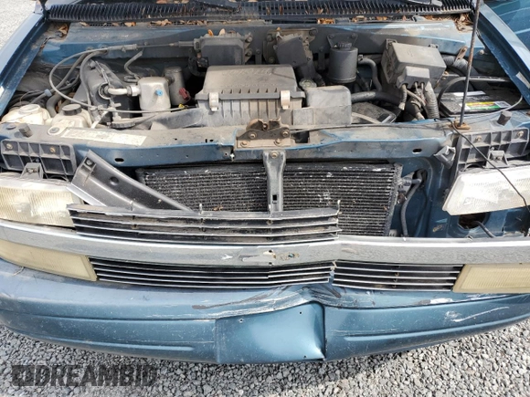2000 Chevrolet Astro with VIN 1GNDM19W1YB143971, listed as a Copart auction lot 77984874 with 278,301 mi miles and Salvage Title. Bid and sale history available at carsss.com. Image 12.