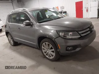 2012 Volkswagen Tiguan S with VIN WVGBV7AX2CW002991, listed as a IAAI auction lot 42031877 with 205,979 mi miles and . Bid and sale history available at DreamBid. Image 1.