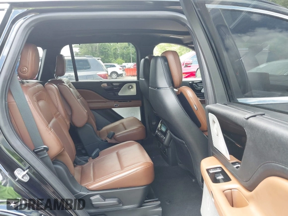 2020 Lincoln Aviator Grand Touring with VIN 5LMYJ8XY2LGL35999, listed as a IAAI auction lot 42344715 with 54,449 mi miles and . Bid and sale history available at DreamBid. Image 8.