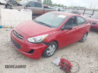 2015 Hyundai Accent GLS with VIN KMHCT4AE4FU909538, listed as a IAAI auction lot 42042487 with 160,293 mi miles. Bid and sale history available at carsss.com. Image 2.