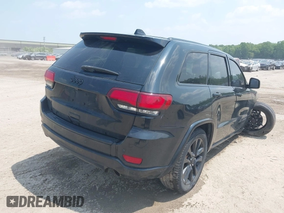 2017 Jeep Grand Cherokee Laredo with VIN 1C4RJFAGXHC818834, listed as a IAAI auction lot 42422744 with 154,287 mi miles and . Bid and sale history available at DreamBid. Image 4.