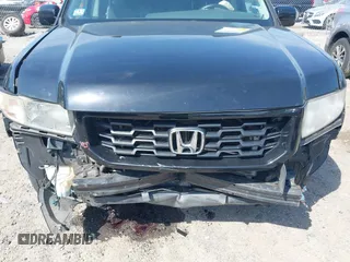 2010 Honda Ridgeline RTL z VIN 5FPYK1F56AB003730, wystawiony jako IAAI lot #42255351 z przebiegiem 190 630 mil mil oraz . Historia ofert i sprzedaży dostępna na DreamBid. Obrazek 6.