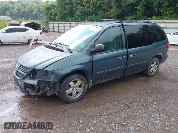 2005 Dodge Caravan SXT with VIN 2D4GP44LX5R159260, listed as a IAAI auction lot 42446336 with 175,917 mi miles and . Bid and sale history available at DreamBid. Image 2.