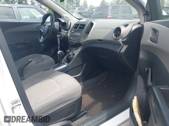 2015 Chevrolet Sonic LS with VIN 1G1JA6SHXF4134063, listed as a IAAI auction lot 42520887 with 221,364 mi miles and . Bid and sale history available at DreamBid. Image 5.