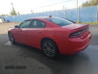 2019 Dodge Charger SXT with VIN 2C3CDXJGXKH611601, listed as a Copart auction lot 71523354 with 133,178 mi miles and Clean Title. Bid and sale history available at DreamBid. Image 2.