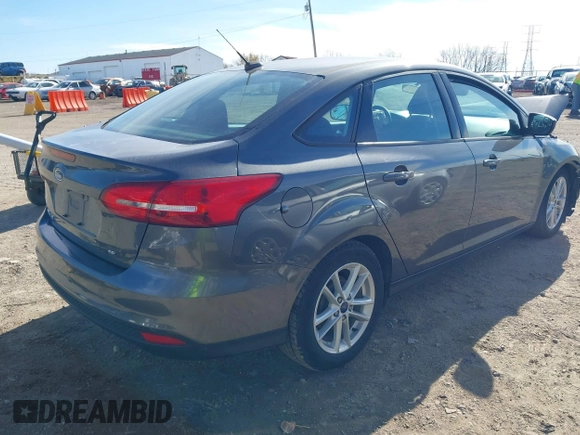 2018 Ford Focus SE z VIN 1FADP3F2XJL316101, wystawiony jako IAAI lot #40805650 z przebiegiem 53 551 mil mil oraz . Historia ofert i sprzedaży dostępna na DreamBid. Obrazek 4.