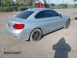 2018 BMW 2 Series 230i with VIN WBA2J1C50JVD09863, listed as a IAAI auction lot 41640142 with 110,432 mi miles. Bid and sale history available at carsss.com. Image 4.