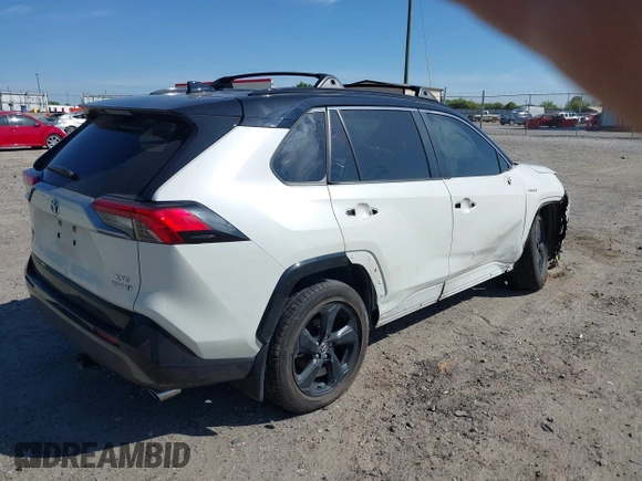 2021 Toyota RAV4 Hybrid XSE with VIN JTME6RFV4MJ008825, listed as a IAAI auction lot 42060148 with 91,129 mi miles and . Bid and sale history available at DreamBid. Image 4.